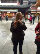 Playing a Chinese flute in Shanghai